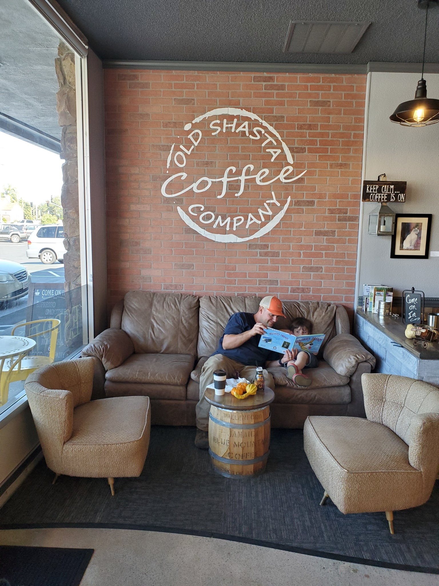 Father and son hanging out at Old Shasta Coffee Company