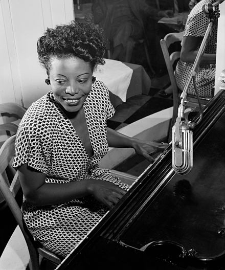 Mary Lou Williams at a piano