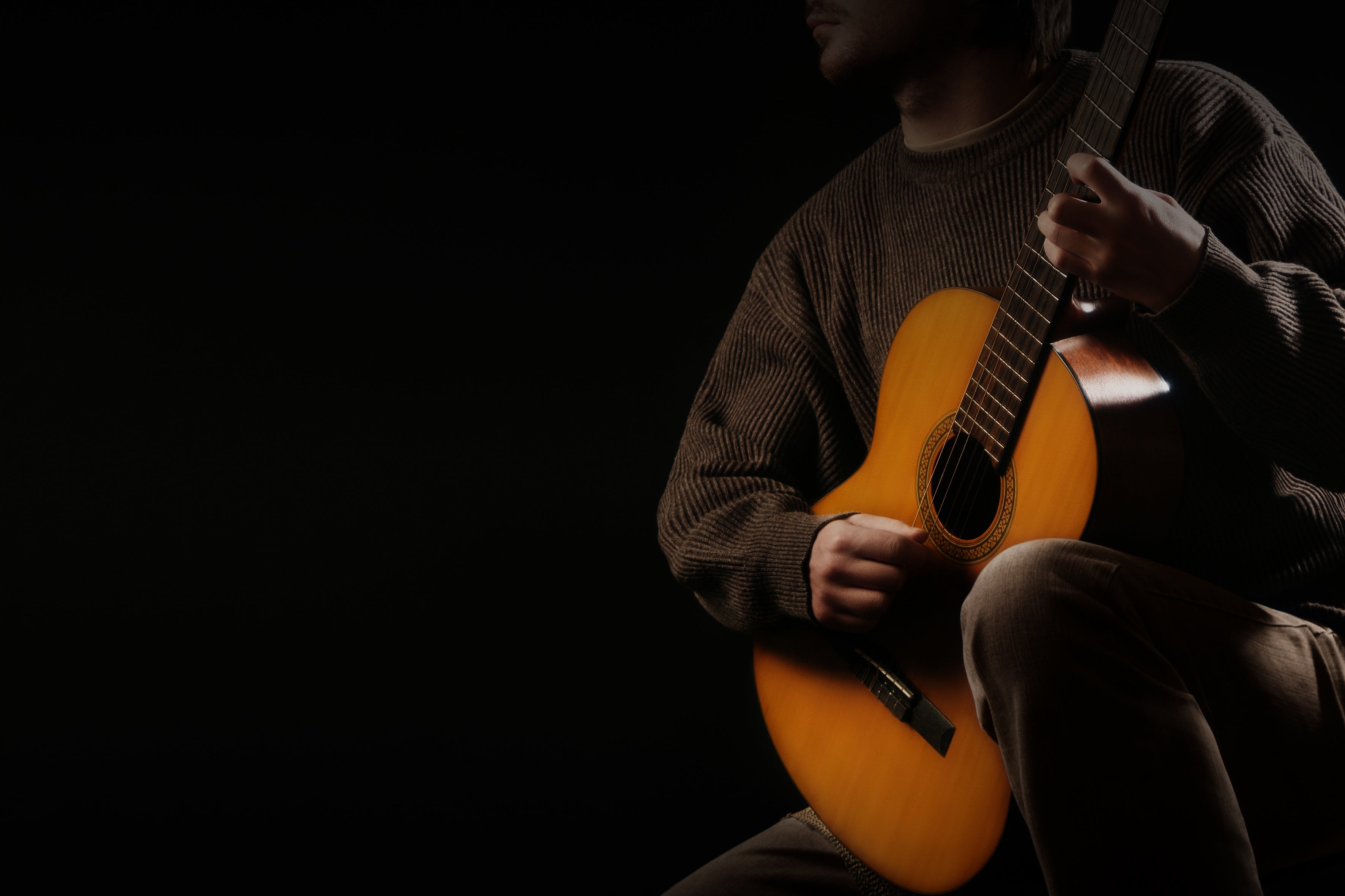 Man playing classical guitar