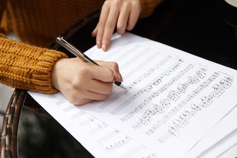 Writing music on paper