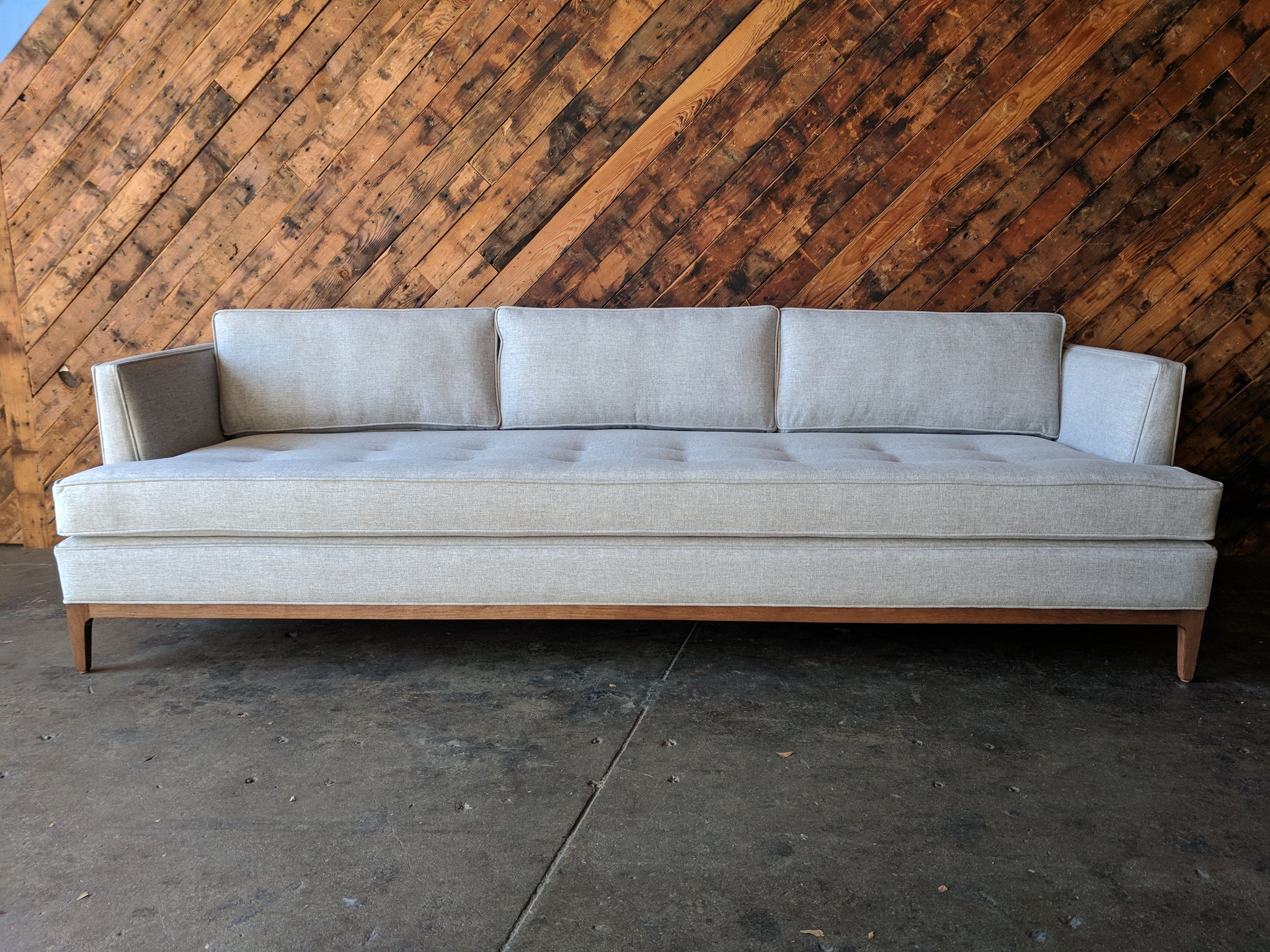gray leather mid century sofa