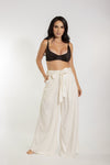 Pantalon largo ivory pretina ancha cinturon bolsillos tela fresca playa calle