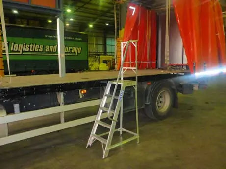 Warehouse Step Infront Of Trailer Bed Ladder