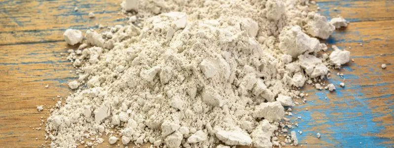 Diatomaceous earth on a wooden counter.
