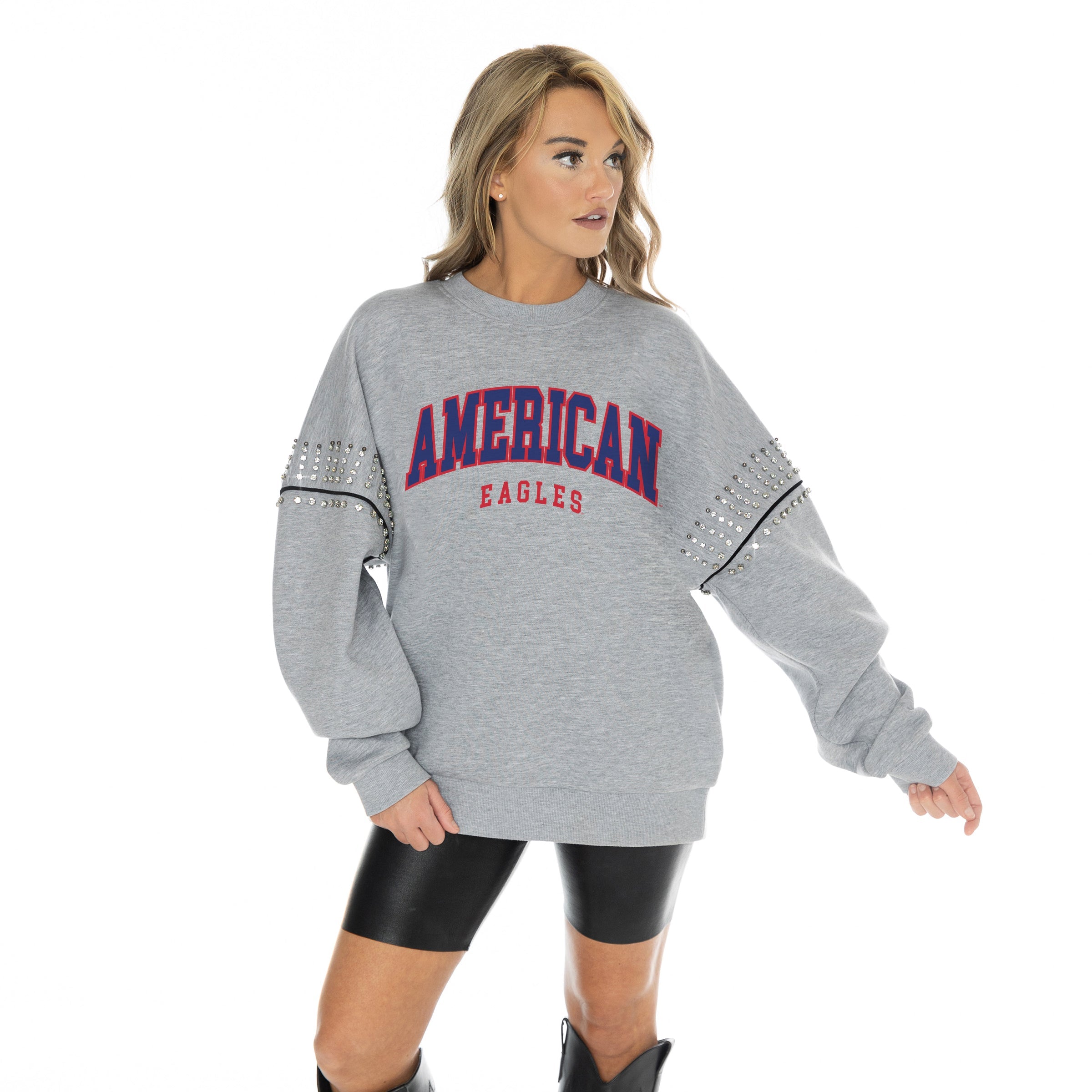 AMERICAN UNIVERSITY EAGLES COMPETITIVE EDGE OVERSIZED DROP SHOULDER CREWNECK FLEECE PULLOVER WITH RHINESTONE AND HEMATITE SHOULDER EMBELLISHMENTS