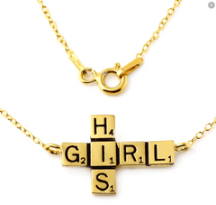 shot of the his girl pendant from the han cholo scrabble jewelry collection