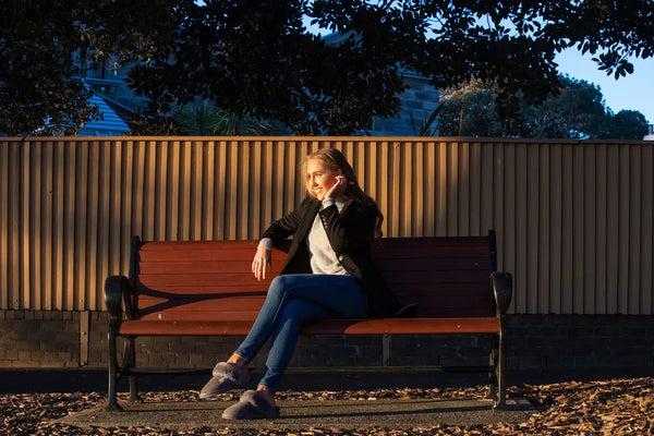 UGG Platinum Fur-Trim Scuffs - Australian Made - Female Model on a park bench