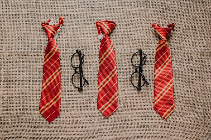 Incendio Harry Potter’s signature rounded glasses and ties