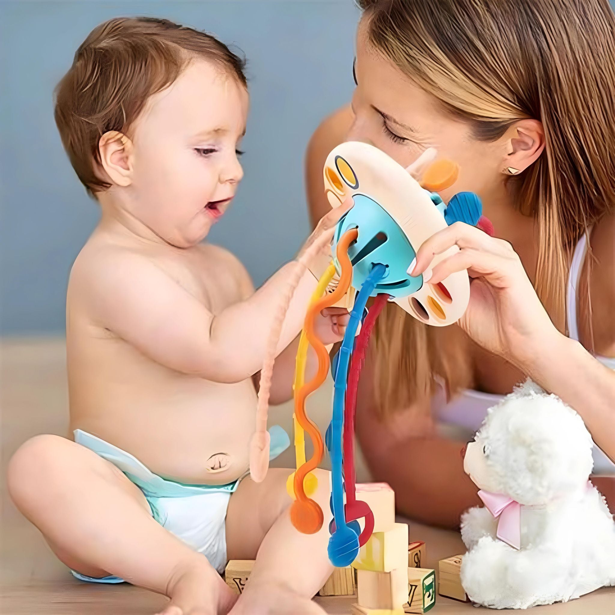 Mãe e Criança Brincando Brinquedo Sensorial Multifuncional