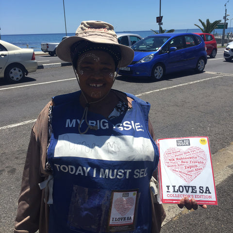 Big Issue Vendor and Sunhat