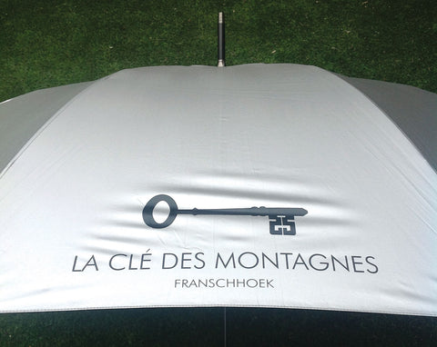 Le Cle des Montagnes branded umbrella