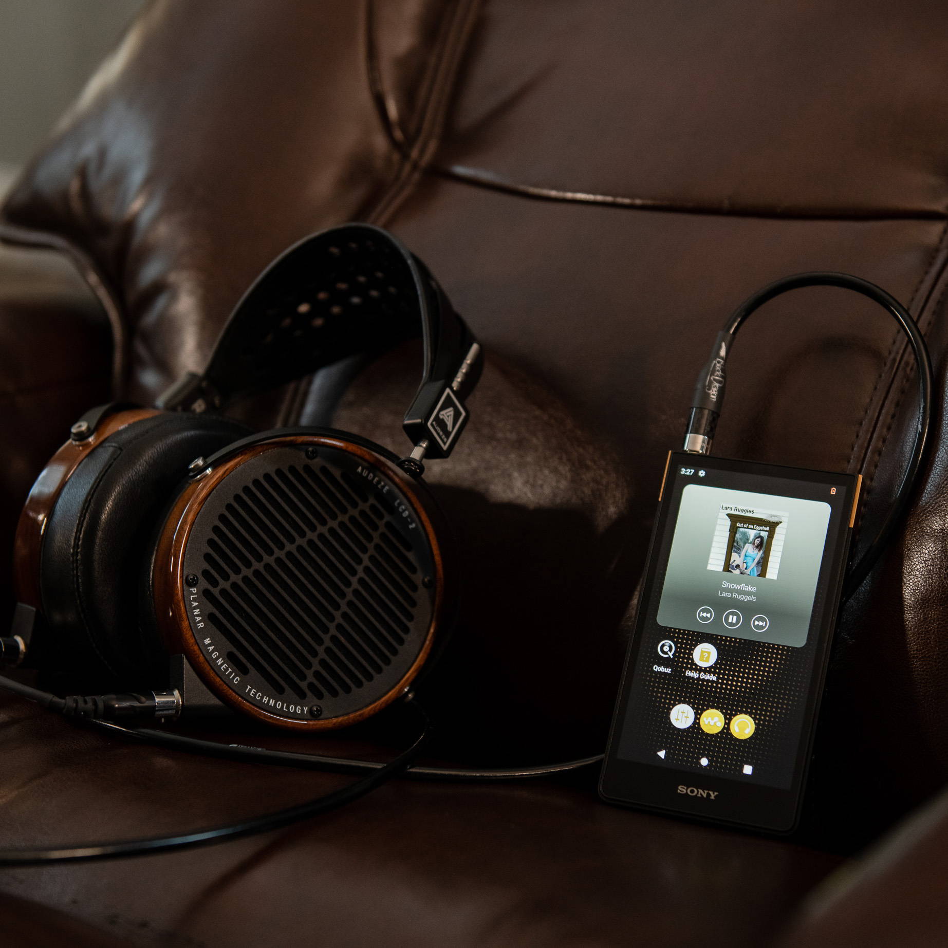 Sony NW-ZX707 with Audeze LCD-2 headphones and SIlver Dragon Headphone Cable on a chair