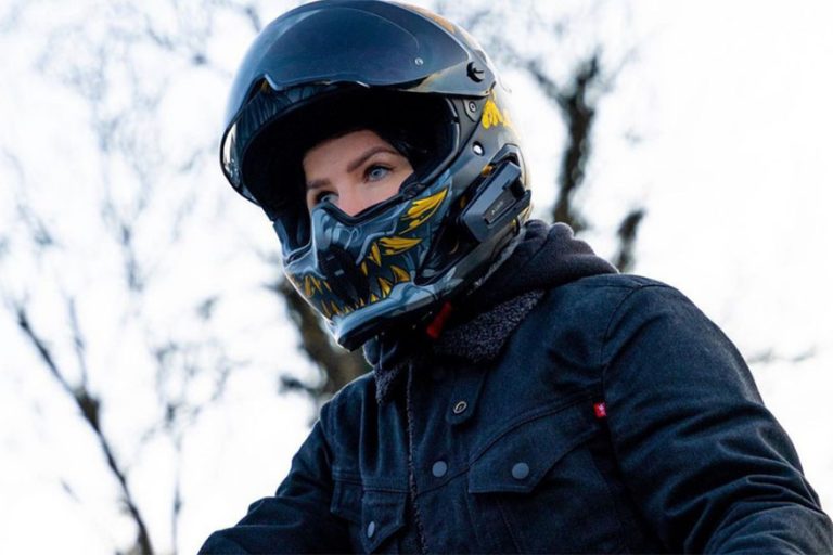 biker with helmet visor open