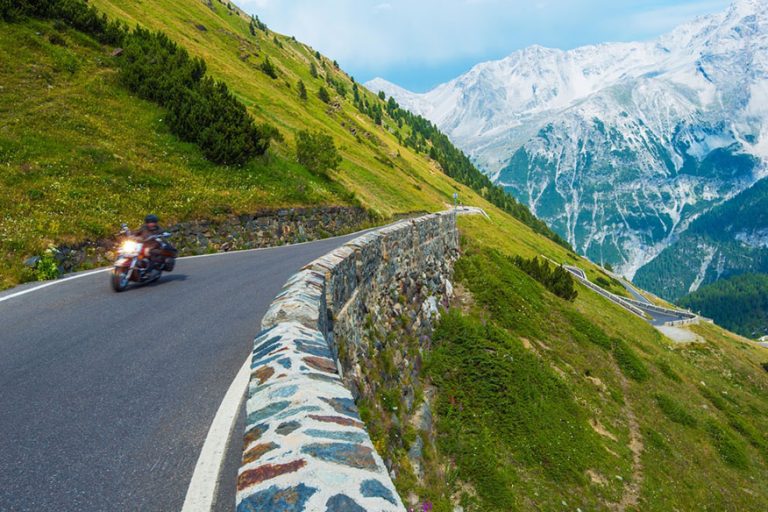 motorcyclist on alpine road