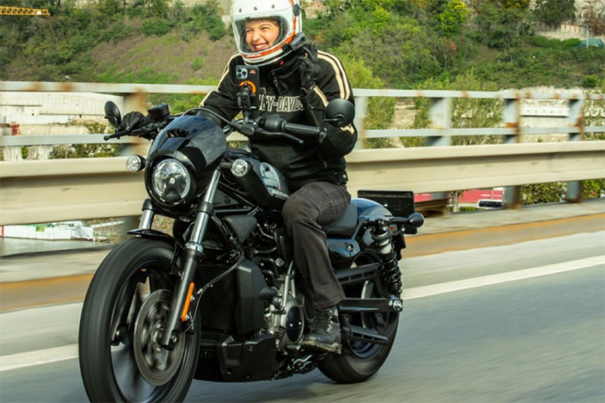 smiling biker on road