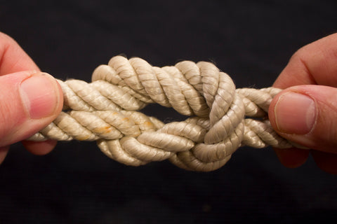 A knot in white rope.