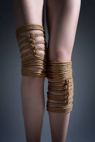 Self-tied leg Shibari.