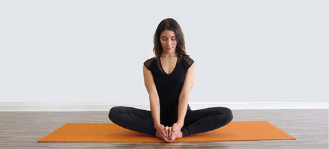 Woman doing Yoga -- Butterfly Pose