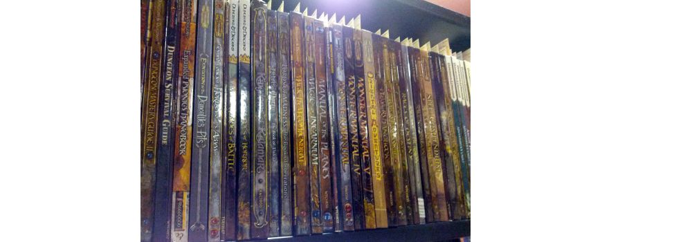 Bookshelf lined with books related to Dungeons and Dragons