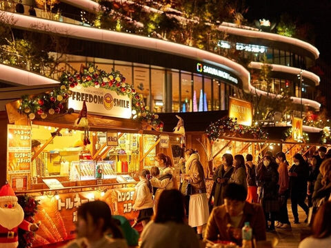 A Japanese Christmas market with plenty of food stalls and people