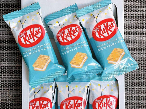 A pack of Sugar Butter Tree mini Kit Kats sit on a table