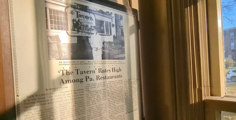 Founder, Cora Durrast in front of her restaurant, The Tavern on the Square. 1980