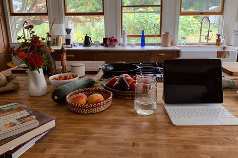 Noble home office. Menu writing. Tomatoes in need of processing. The big zucchini.