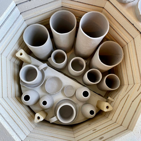 kiln full of pottery seen from above