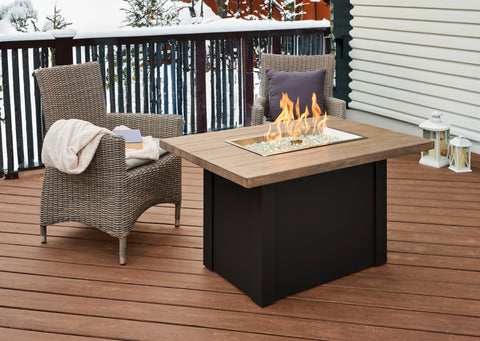 Cozy up around the Havenwood Fire Pit Table this winter.