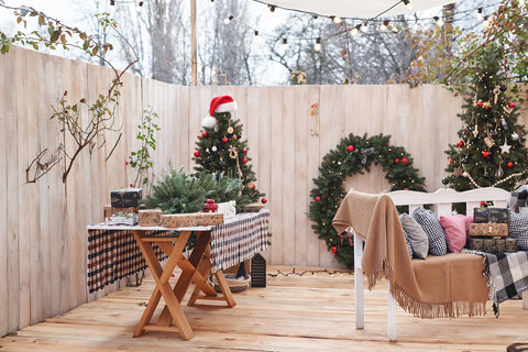 Get creative with outdoor decorations that can withstand the cold, and you'll have your guests feeling like they've stepped into a winter wonderland