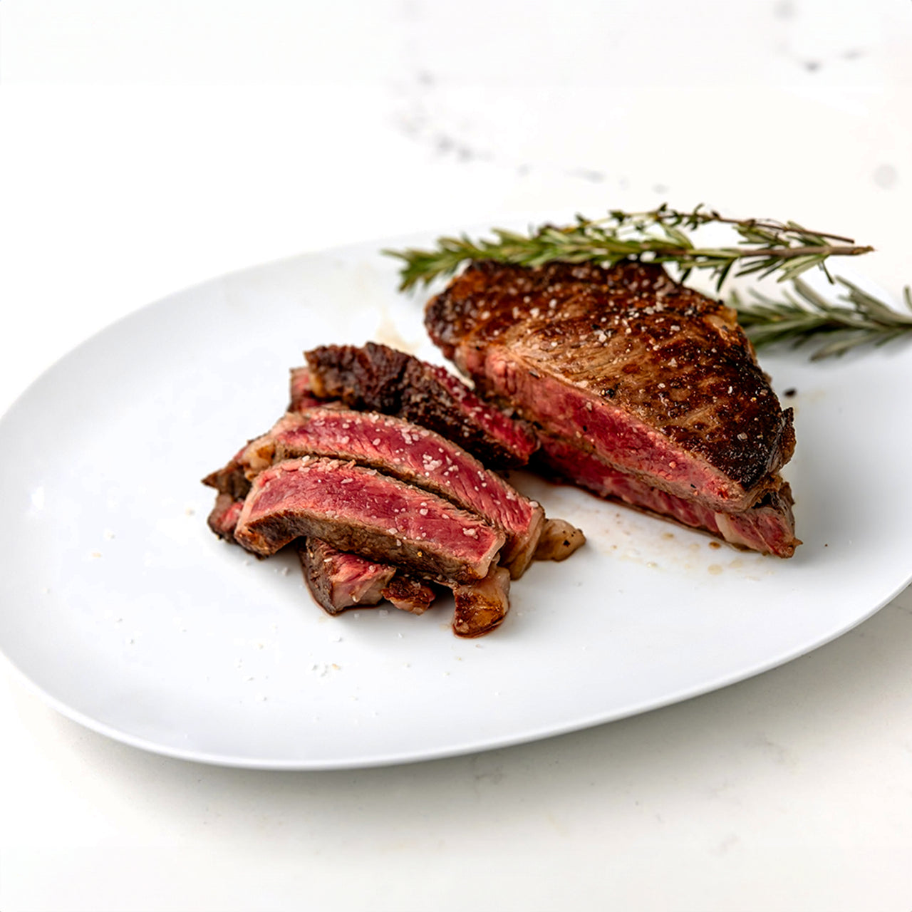 Cast Iron Seared Bone-In Ribeye Steaks