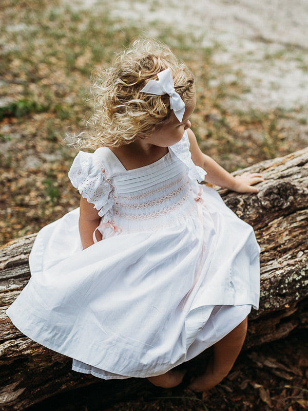 girls white pinafore