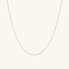 Barrel Link Chain Necklace displayed on a white background, showcasing its elegant gold chain design.