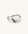 Silver Dôme Figure Ring with a unique curved design, reflecting different angles. Inspired by slow, intentional movement, perfect as a fashion accessory.