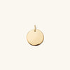 Engravable Disc Charm featuring a sleek gold circle pendant, ideal for personalized inscriptions.