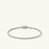 Lab Grown Diamond Tennis Bracelet 1.8mm: a close-up of a silver bracelet with small lab-grown diamonds, showcasing its intricate design and secure clasp mechanism.