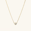 Bezel Lab Grown Diamond Necklace: A gold necklace featuring a bezel-set lab grown diamond pendant, showcasing classic elegance with ethical craftsmanship.