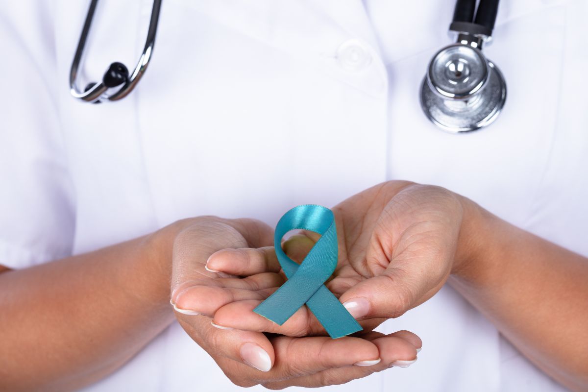 A doctor holding Scleroderma Ribbon Color