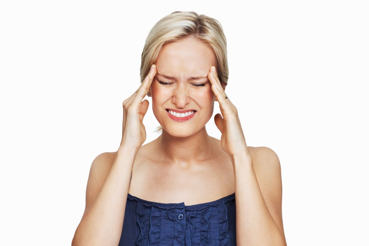 A lady facing severe headache a signal of stroke.