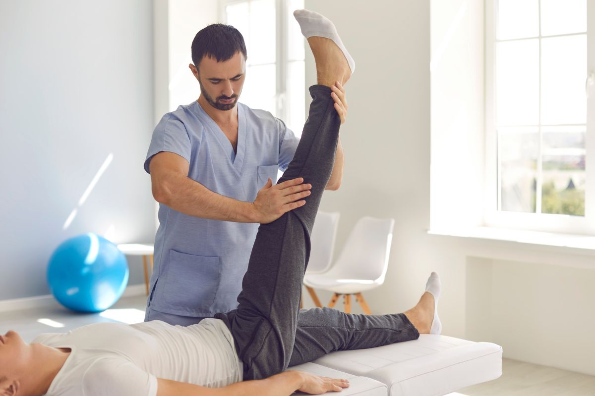 A person getting leg excercise to regain the mobility he has before the stroke.