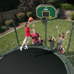 kids playing on trampoline with basketball hoop