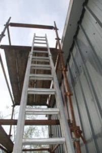 An image of a ladder looking up to the top
