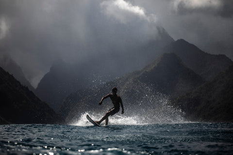 Photographer Alex Voyer shooting with Outex at Teahupoo's famous Surf Break 5