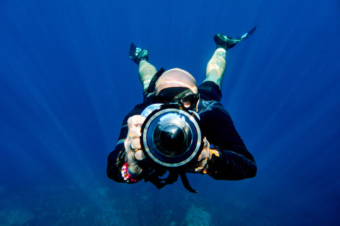 Eric Barnabe using Outex waterproof housing system in the ocean