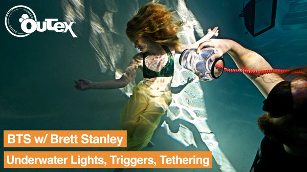 Pro photographer Brett Stanley using Outex waterproof camera system for underwater tethering with strobes, triggers, and lights