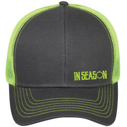 black and lime green trucker hat