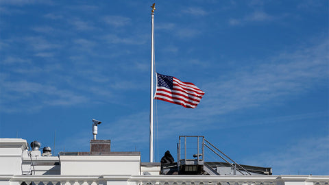 Ravenox flag flown at half-staff or half mast