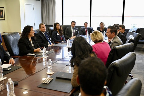 SBA Administrator Isabelle Guzman at SBA's Headquarters in Washington, D.C. discussing the importance of ensuring affordable and equitable access to digital technologies for small businesses with Ravenox CEO Sean Brownlee