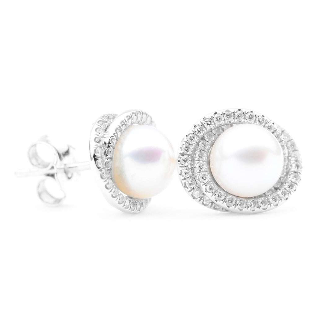 pearl earrings with diamonds around