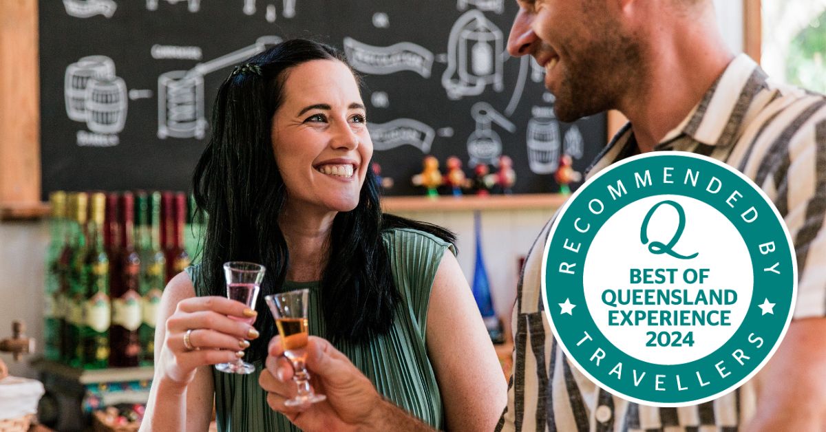 People having a tasting with Best of Queensland logo